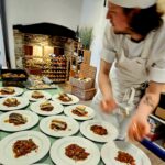 A chef preparing meals for an event.
