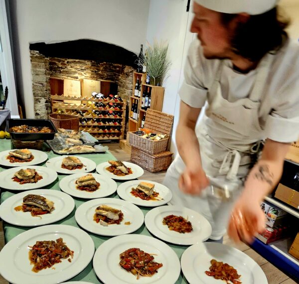 A chef preparing meals for an event.